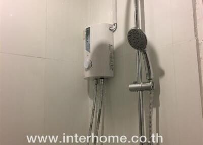Bathroom shower with water heater