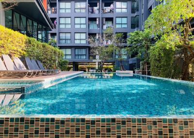 Swimming pool in front of a modern residential building