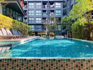 Swimming pool in front of a modern residential building