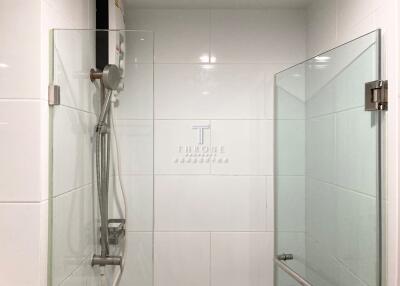 Shower area with glass enclosure