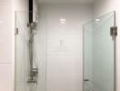 Shower area with glass enclosure