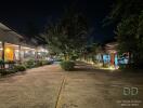 Night view of the pavement and buildings with outdoor lighting