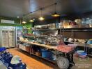 Spacious commercial kitchen with storage and appliances