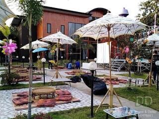 Outdoor seating area with parasols and cushions