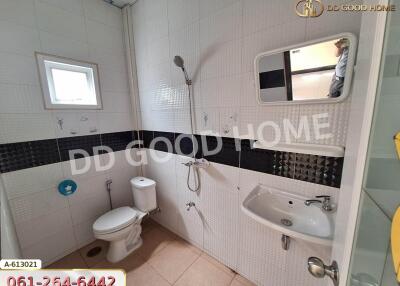 Bathroom with white tiles and modern fixtures