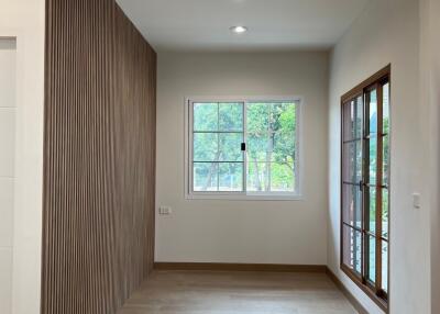 Well-lit interior space with wooden accents and large windows