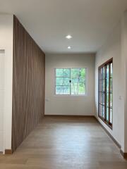 Well-lit interior space with wooden accents and large windows