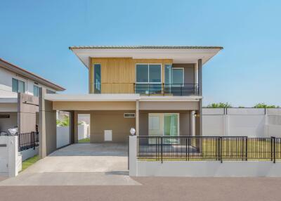 Modern two-story house with driveway and front yard