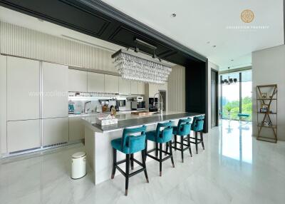 Modern kitchen with an island and bar stools