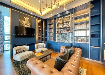 Modern living room with elegant decor and a built-in bar