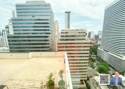 View of city high-rise buildings from an outdoor terrace