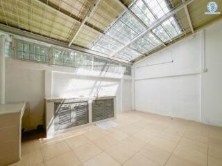 Spacious kitchen with skylight roof