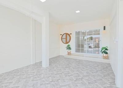 Bright and spacious living room with large windows