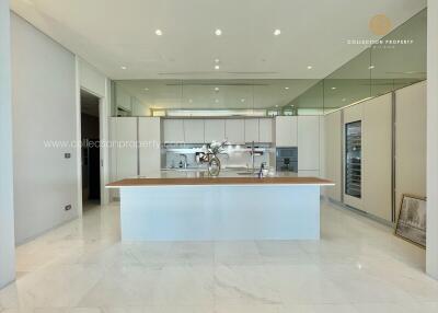 Modern kitchen with island and white cabinets