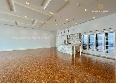 Spacious open kitchen and dining area with modern fixtures