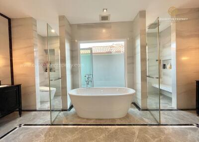 Modern bathroom with freestanding bathtub