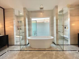 Modern bathroom with freestanding bathtub