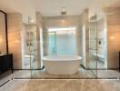 Modern bathroom with freestanding bathtub