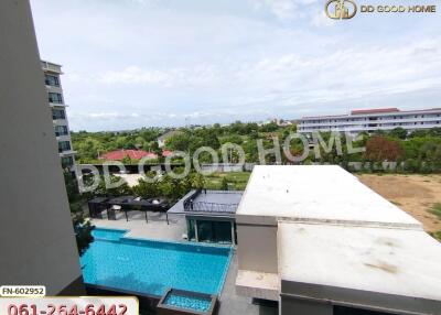 View of the building and swimming pool area.