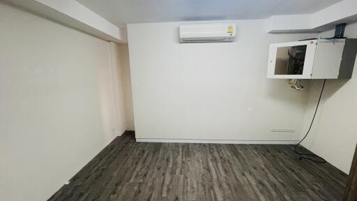 Unfurnished bedroom with air conditioning