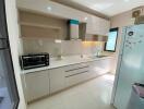 Modern kitchen with appliances and cabinetry