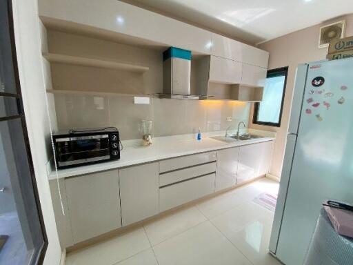 Modern kitchen with appliances and cabinetry