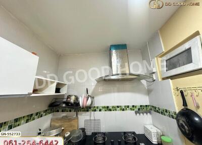 Modern kitchen with stove and storage