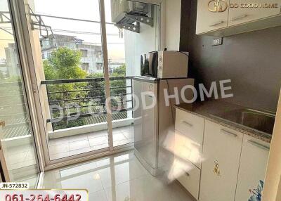 Modern kitchen with balcony view