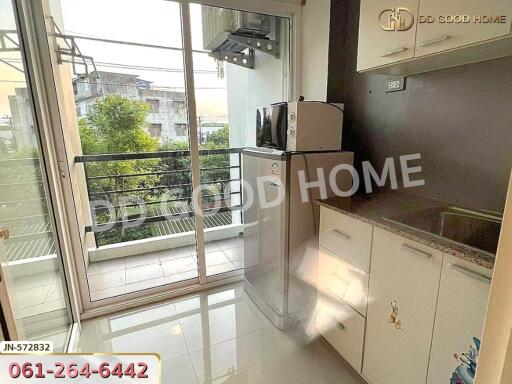 Modern kitchen with balcony view