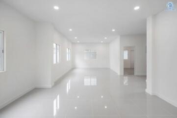 Spacious and well-lit living room with large windows