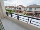 View from the balcony overlooking neighboring houses