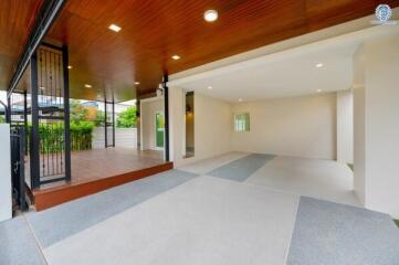 Covered outdoor area with a garage space