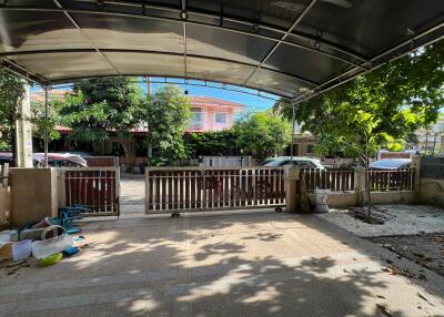 Covered patio area with a view of the street