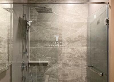 Modern bathroom with glass shower enclosure