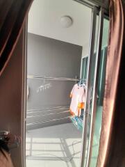 Balcony with clothes drying racks