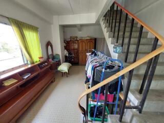 Bedroom with storage and staircase