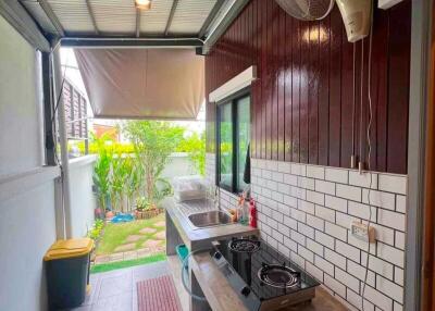 Outdoor kitchen with garden view