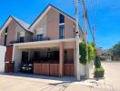 Modern two-story house with garage and driveway