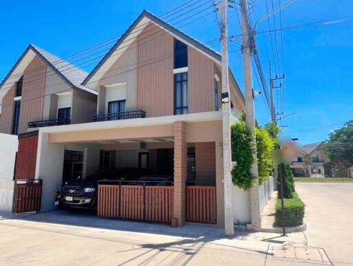 Modern two-story house with garage and driveway