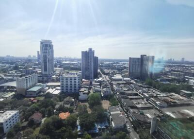 View of the city from above with several tall buildings