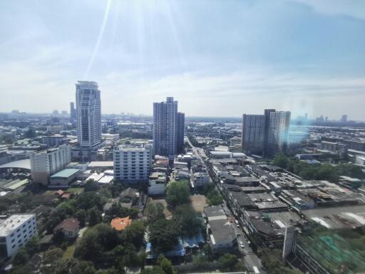 View of the city from above with several tall buildings