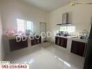 kitchen with modern appliances and ample counter space