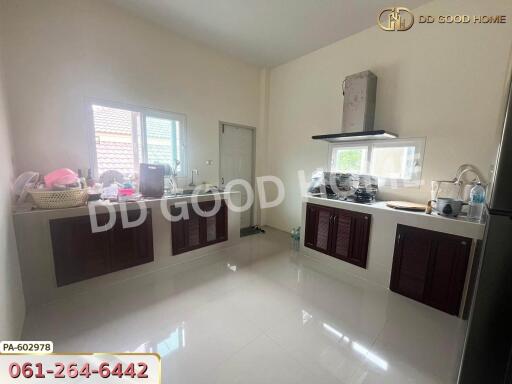 kitchen with modern appliances and ample counter space