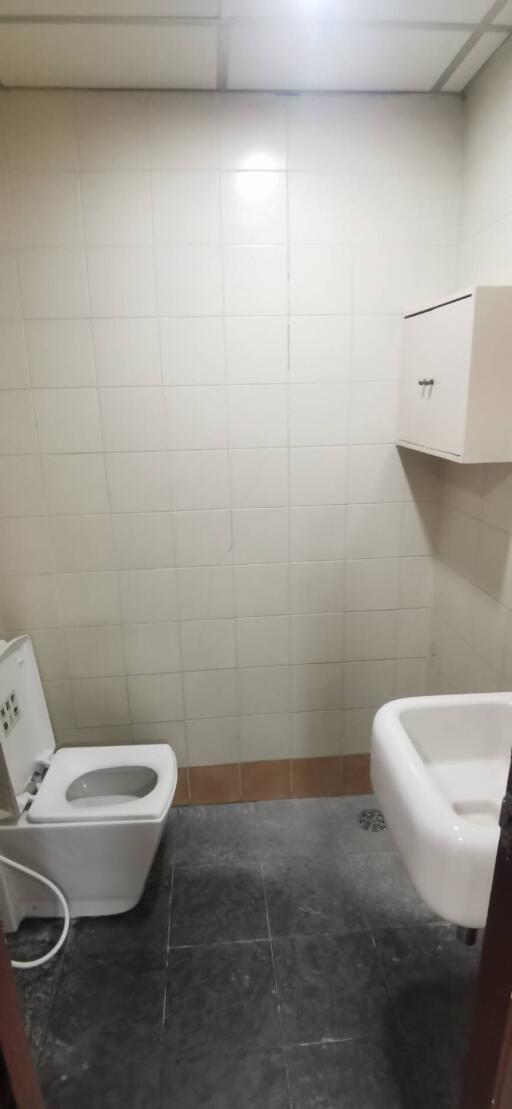 Bathroom with toilet and sink