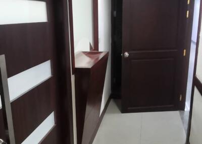 Modern hallway with wooden doors