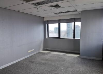 Unfurnished office space with large windows