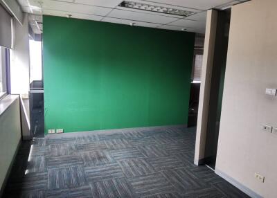 Modern office space with green accent wall