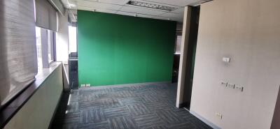 Modern office space with green accent wall