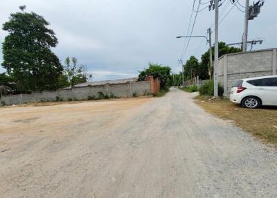 Gravel road with parked car