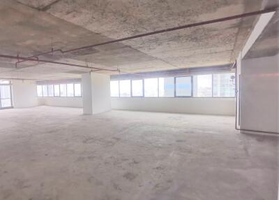 Unfinished commercial space with large windows